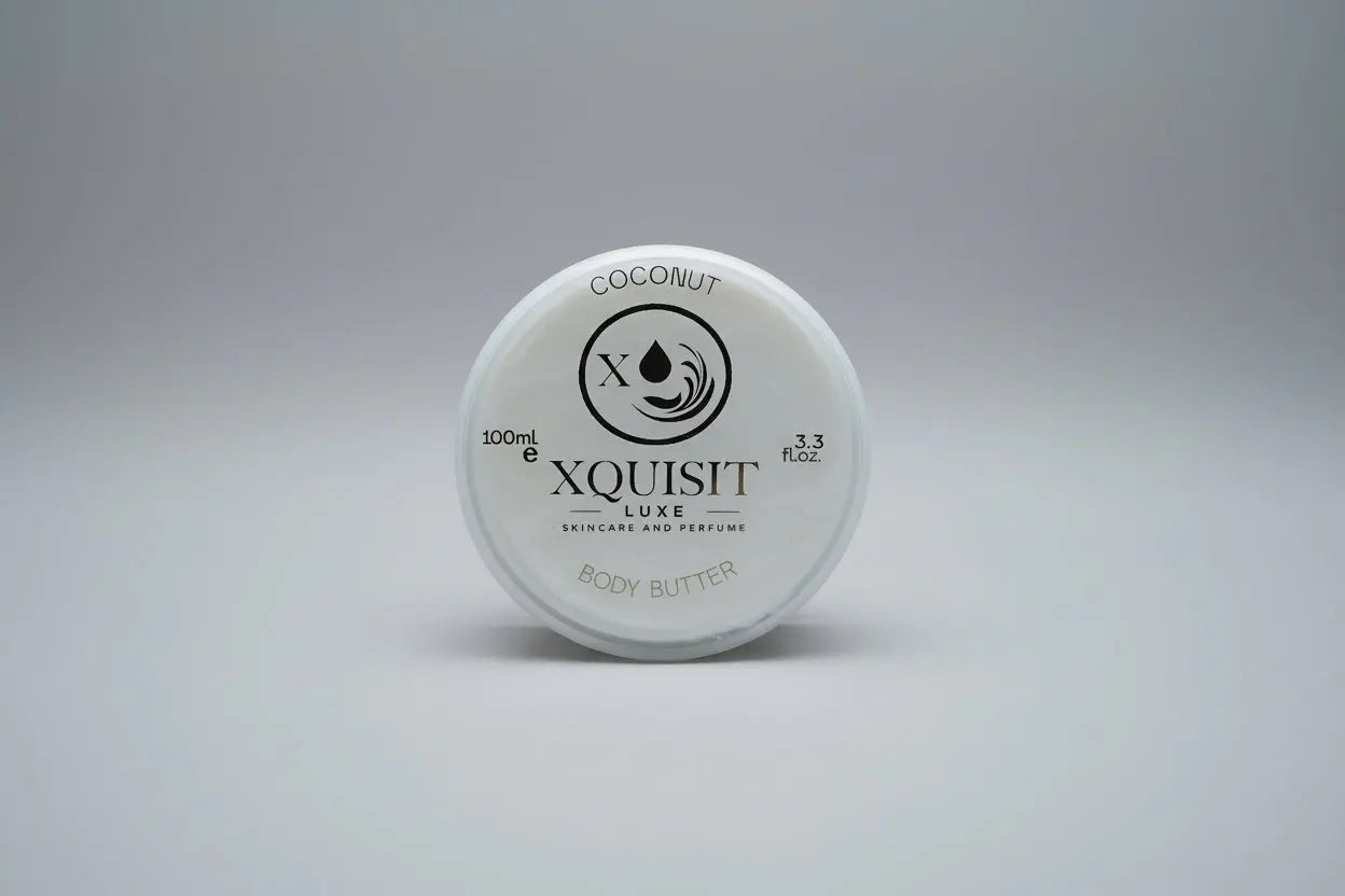 Xquisit Luxe coconut body butter container on a textured surface
